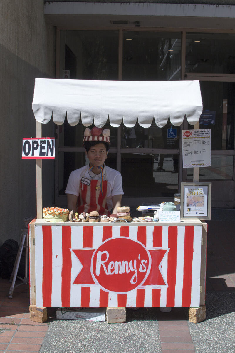 Reniel Del Rosario (BA’19) runs a ceramic food stand outside of Bauer Wurster Hall.