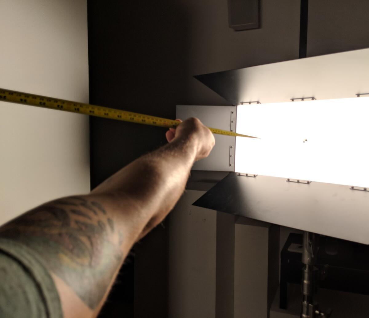 Robert Borsdorf measuring light.